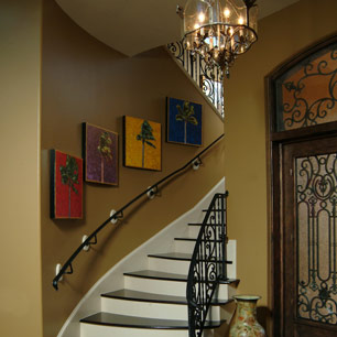 Entry with chandelier lighting, wood flooring and Benjamin Moore paint