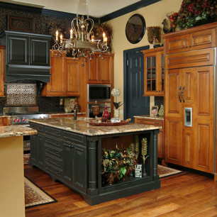 Kitchen featuring granite, chandelier lighting and tile
