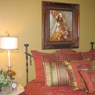 Guest bedroom with luxury bedding and accessories
